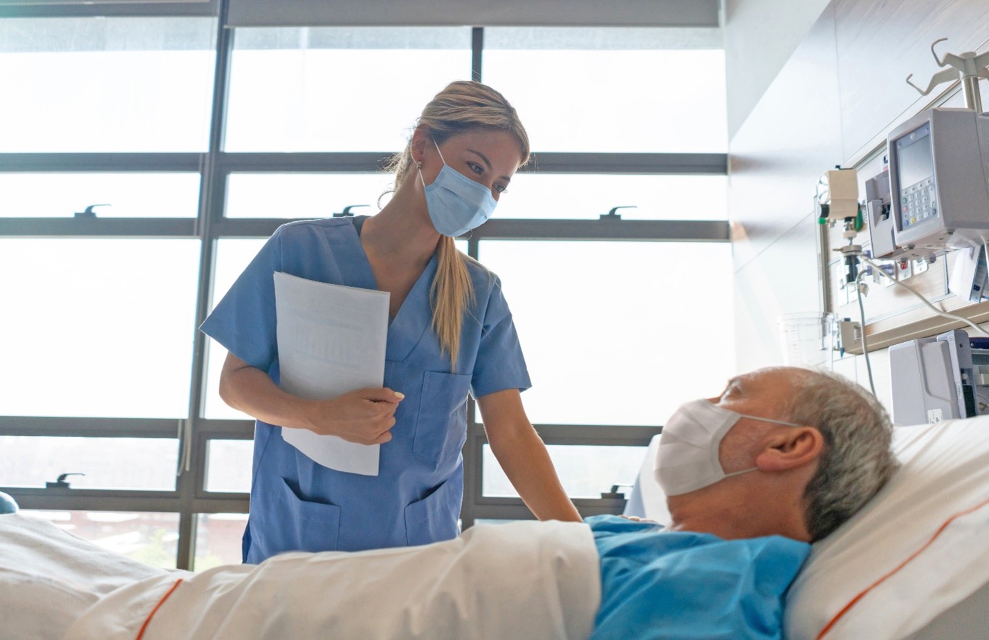 nurse-at-patient-bed-workplace-violence-blog